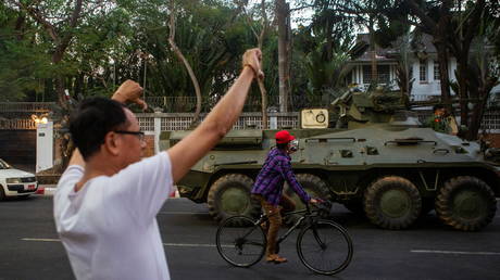 An armoured vehicle rides on a street during a protest against the military coup, in Yangon, Myanmar, February 14, 2021 © REUTERS/Stringer