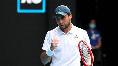 Russian tennis star Aslan Karatsev has made the Australian Open semifinals and could face Novak DJokovic next © Kelly Defina / Reuters