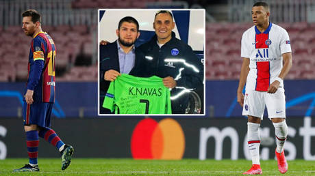 UFC star Khabib Nurmagomedov (center) watched football hitmen Kylian Mbappe (right) and Lionel Messi as Barcelona played Paris Saint-Germain in the Champions League © Albert Gea / Reuters