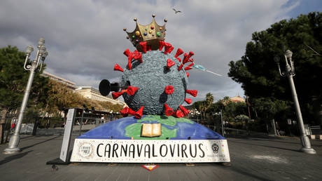 FILE PHOTO. A Carnival float depicting the novel coronavirus is seen in Nice, France on February 16, 2021.