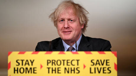 FILE PHOTO: Britain's Prime Minister Boris Johnson holds a coronavirus disease (COVID-19) pandemic media briefing at 10 Downing Street in London, Britain February 22, 2021