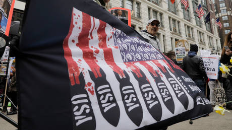 FILE PHOTO: Anti-war demonstrators take part in a protest in New York City, US, April 15, 2018