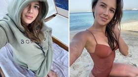 Sting in the tale: Russian gymnastics queen Soldatova suffers livid jellyfish marks after sea swim goes wrong on holiday in Dubai
