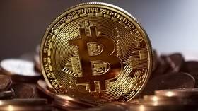 Bitcoin breaks above $50,000 for first time in history as wider crypto adoption fuels record rally