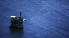 Global oil prices top 13-month high on slow restart of US output