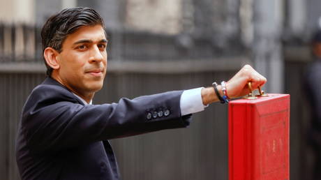 UK govt budget extends furlough scheme, unveils corporation tax hike to plug economic black hole of wage-paying jobs lost to Covid