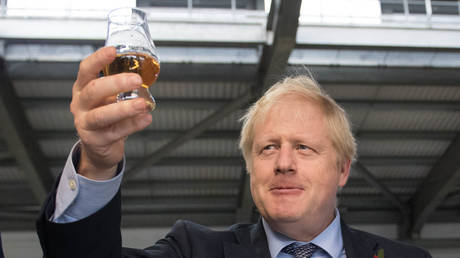 UK Prime Minister Boris Johnson tastes whisky in Scotland