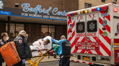 A nursing home resident is placed in an ambulance in the Brooklyn borough of New York, US, April 16, 2020.