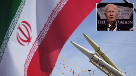 FILE PHOTO: Iran-made, Dezful medium range ballistic missile and Zolfaghar road-mobile single-stage solid-propelled liquid fueled missile are seen next to an Iran flag in the Azadi square. © Getty Images / Morteza Nikoubazl / NurPhoto; (inset) US President Joe Biden © REUTERS / Carlos Barria