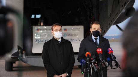 FILE PHOTO: Slovak Prime Minister Igor Matovic (R) and Slovak Health Minister Marek Krajci (L) give a press statement at the International Airport in Kosice, Slovakia, on March 1, 2021.