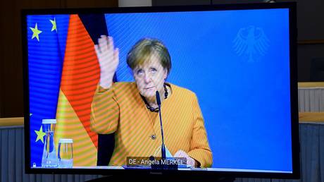 German Chancellor Angela Merkel on a screen during a video-conferenced meeting with European Council President Charles Michel at the European Council in Brussels, on March 5, 2021.