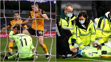&lsquo;Horrible collision&rsquo;: Wolves goalie Rui Patricio stricken on pitch for 14 MINUTES after sickening head blow (VIDEO)