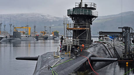 FILE PHOTO. RHU, SCOTLAND - JANUARY 20: Royal Navy security personnel stand guard on HMS Vigilant. © Getty Images / Jeff J Mitchell