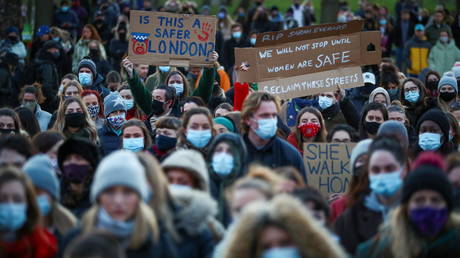 FILE PHOTO: People gather at a memorial site in Clapham Common Bandstand, following the kidnap and murder of Sarah Everard, in London, Britain March 13, 2021