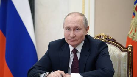 Russian President Vladimir Putin attends a meeting with public representatives of the Republic of Crimea and Sevastopol on the 7th anniversary of the referendum on the state status of the republic and its reunification with Russia, via teleconference call at the Kremlin in Moscow, Russia.© Sputnik