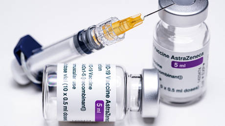 FILE PHOTO. In this file photo taken in 2021, vials of the AstraZeneca Covid-19 vaccine and a syringe are seen in Paris on March 11, 2021.© AFP / JOEL SAGET