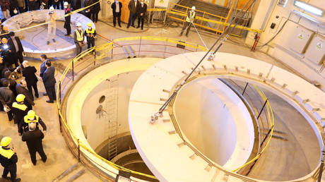 Members of the media and officials tour the water nuclear reactor at Arak, Iran December 23, 2019.