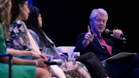 FILE PHOTO: Former President Bill Clinton attends a meeting of the Clinton Global Initiative Action Network in San Juan, Puerto Rico, February 18, 2020.