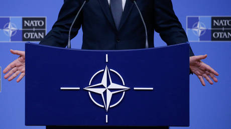 FILE PHOTO. A picture shows the NATO logo as NATO Secretary General Jens Stoltenberg holds a press conference during a NATO Defence ministers' meeting in Brussels on February 13, 2020. © AFP / Aris Oikonomou