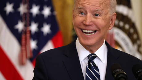 FILE PHOTO: US President Joe Biden talks to reporters during the first news conference of his presidency in the East Room of the White House on March 25, 2021 in Washington, DC
