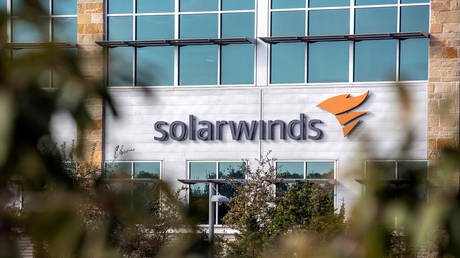 FILE PHOTO: The SolarWinds logo is seen outside its headquarters in Austin, Texas, US, December 18, 2020.