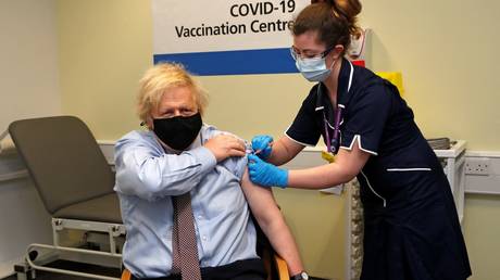 Britain's Prime Minister Boris Johnson receives his first dose of a Covid-19 vaccine, London on March 19, 2021