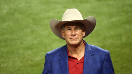 Texas Governor Greg Abbott is shown at a World Series baseball game last October near Dallas.