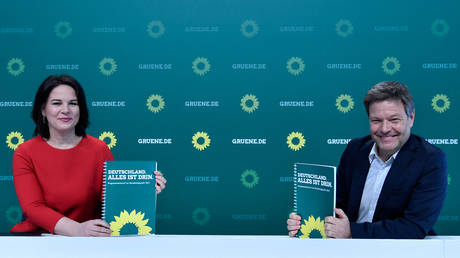 Leaders of the Green party Annalena Baerbock (L) and Robert Habeck present the draft of their party's electoral program in Berlin on March 19, 2021