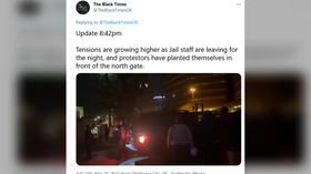 Protest outside Oklahoma jail after police shoot & kill inmate who took corrections officer hostage over poor conditions (VIDEO)