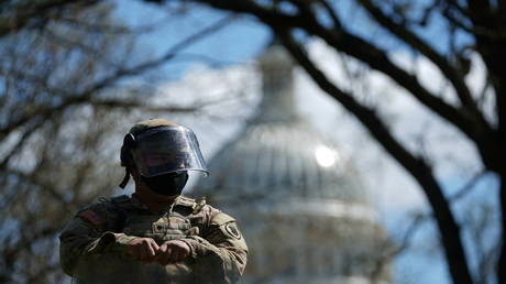 U.S. National Guard trooper guards streets surrounding the U.S. Capitol and congressional office buildings following a security threat at the U.S. Capitol in Washington, DC, US on April 2, 2021 © REUTERS/Erin Scott