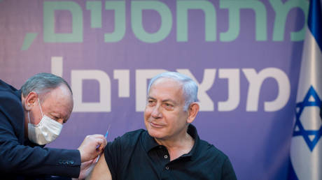 Israeli Prime Minister Minister Benjamin Netanyahu receives the second dose of the Covid-19 vaccine, January 9, 2021.