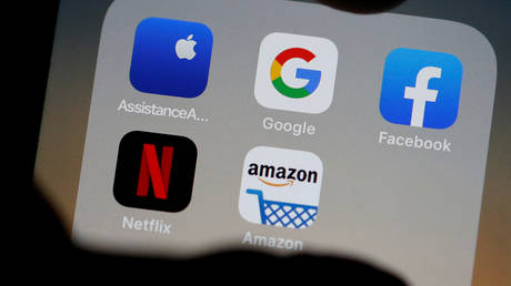 The logos of mobile apps, Google, Amazon, Facebook, Apple and Netflix, are displayed on a screen in this illustration picture taken December 3, 2019.