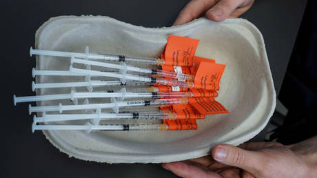 FILE PHOTO: Syringes with AstraZeneca's vaccine against Covid-19 on March 11, 2021 © REUTERS/Essi Lehto