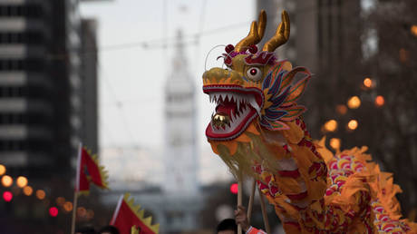 FILE PHOTO. People perform dragon dance during San Francisco Chinese New Year Parade © Getty Images / Yichuan Cao