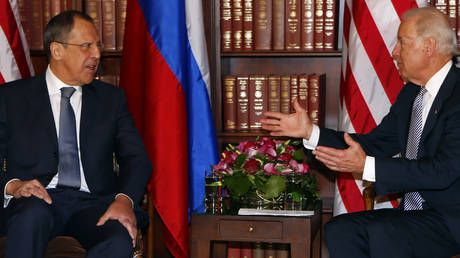 FILE PHOTO. Russia's Foreign Minister Sergey Lavrov meets then-US Vice-President Joe Biden in February 2013.