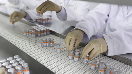 World&rsquo;s biggest vaccine producer blames Biden&rsquo;s embargo on crucial raw materials for crippling production of Covid-19 jabs