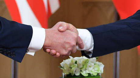 Russian President Vladimir Putin and US President Donald Trump meet at the Presidential Palace in Helsinki.