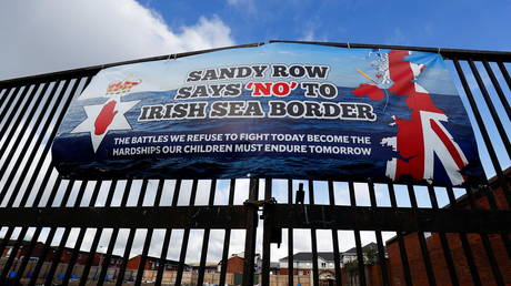 A banner on a gate on Sandy Row street is pictured, following a week of violence, in Belfast, Northern Ireland, (FILE PHOTO) © REUTERS/Jason Cairnduff