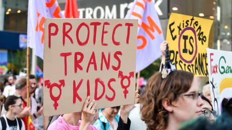 Placard saying, Protect the Trans kids, during the Trans march. Spectators displayed their support towards the transgender and non-binary people while demonstrating on the streets of Toronto in a Trans March during the Pride Month.