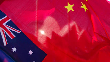 FILE PHOTO. Australian and Chinese flags