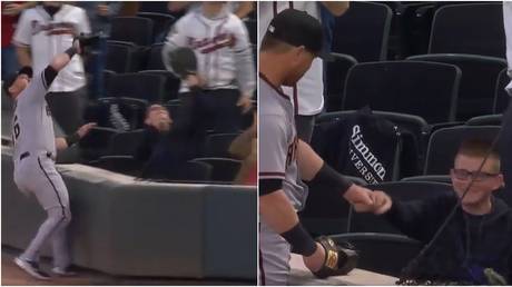 &lsquo;He never left his seat!&rsquo; Youngster sends baseball fans wild by effortlessly beating player to viral catch at first game (VIDEO)