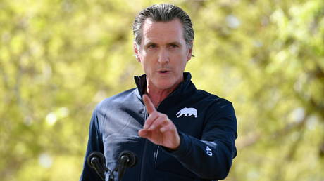 FILE PHOTO: California Governor Gavin Newsom speaks during a visit by First Lady Jill Biden, in Delano, California, March 31, 2021.