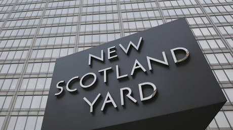 Two Met officers charged with misconduct over photos of murdered sisters taken at London crime scene