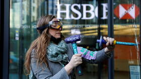 Extinction Rebellion activists break windows, stage protest outside HSBC HQ in London over fossil fuel financing