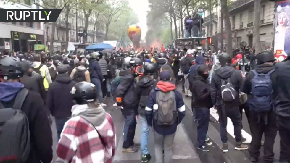 Parisians demonstrate on International Workers' Day On Air ...