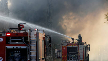 FILE PHOTO. Israeli firefighters.