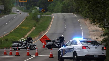 Police block Dolley Madison Boulevard in McLean, Virginia in response to a standoff at the main gate of CIA headquarters in Langley, May 3, 2021.