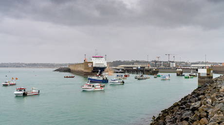 French fishing fleet is seen at the entrance to the harbour in St Helier, Jersey, May 6, 2021 © Marc Le Cornu/via REUTERS