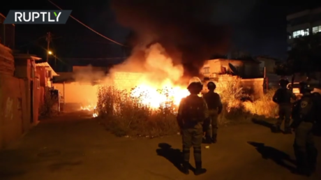 Car torched in East Jerusalem as clashes over Palestinian evictions continue (VIDEO)