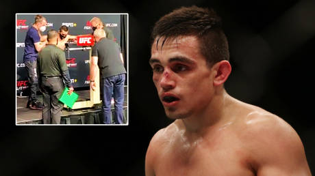 &lsquo;This is crazy&rsquo;: Shocking scenes as UFC fighter struggles to stand, needs help to leave weigh-in before fight is canceled (VIDEO)